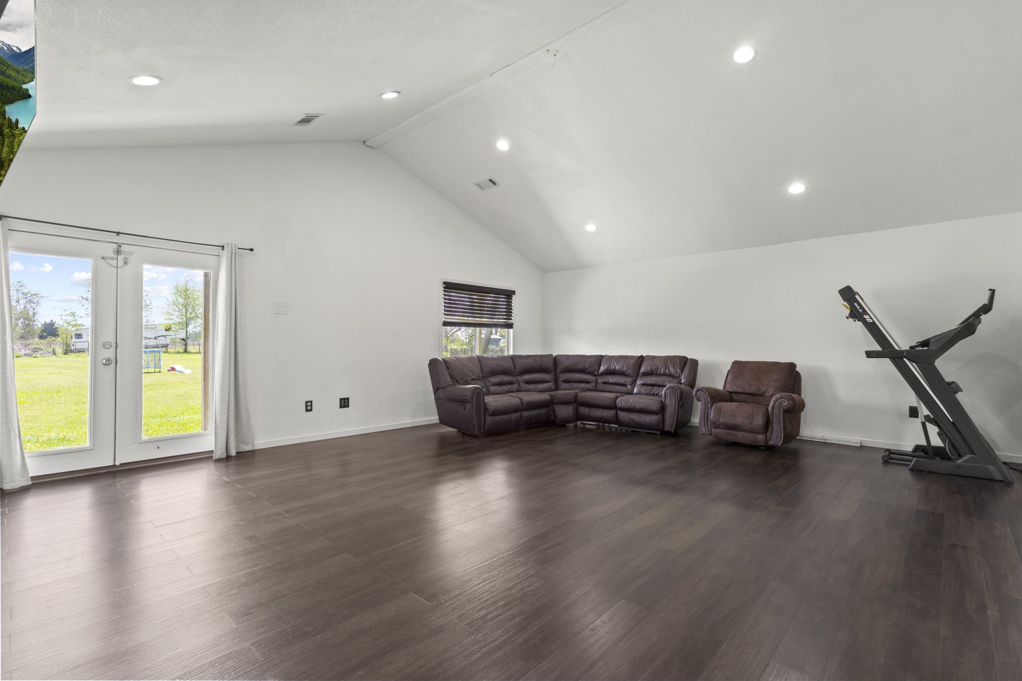 19961 Englin Road Winnie, TX 77665 - Photo 11 of 26 a view of a room with wooden floor and pool table