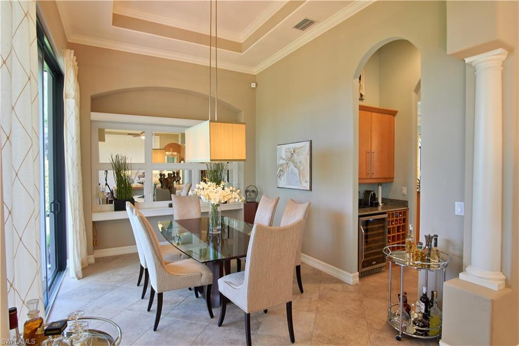 7389 Byrons Way Naples, FL 34113 - Photo 14 of 35 a dining room with furniture and window