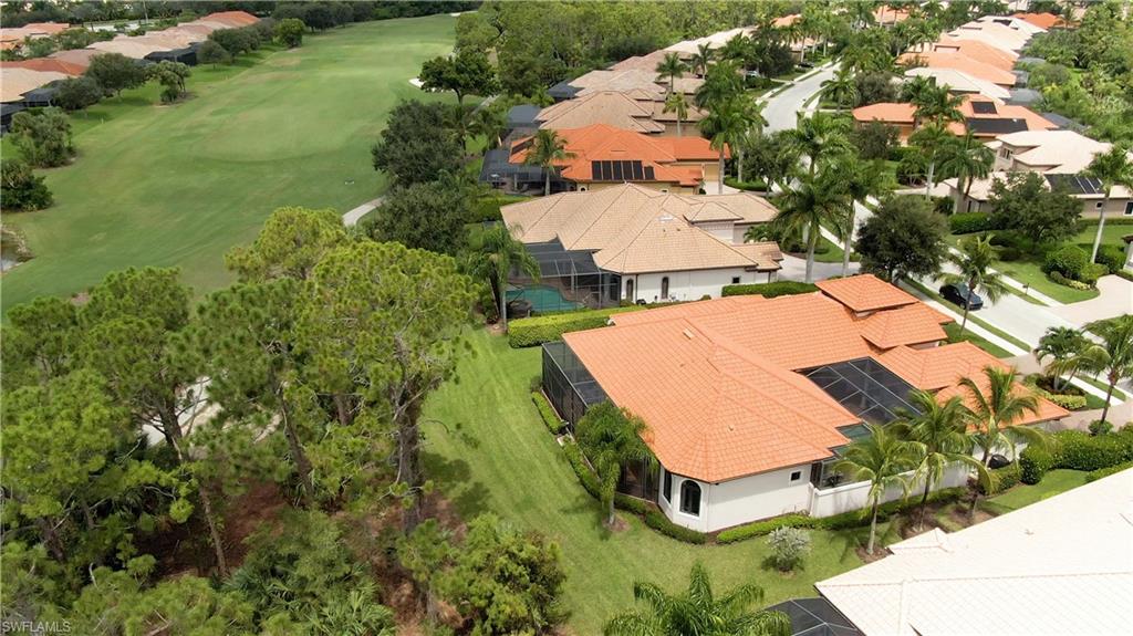 7389 Byrons Way Naples, FL 34113 - Photo 6 of 35 an aerial view of a house with outdoor space and street view