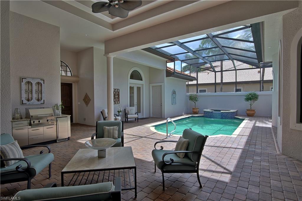 7389 Byrons Way Naples, FL 34113 - Photo 9 of 35 a view of a livingroom with furniture and a window