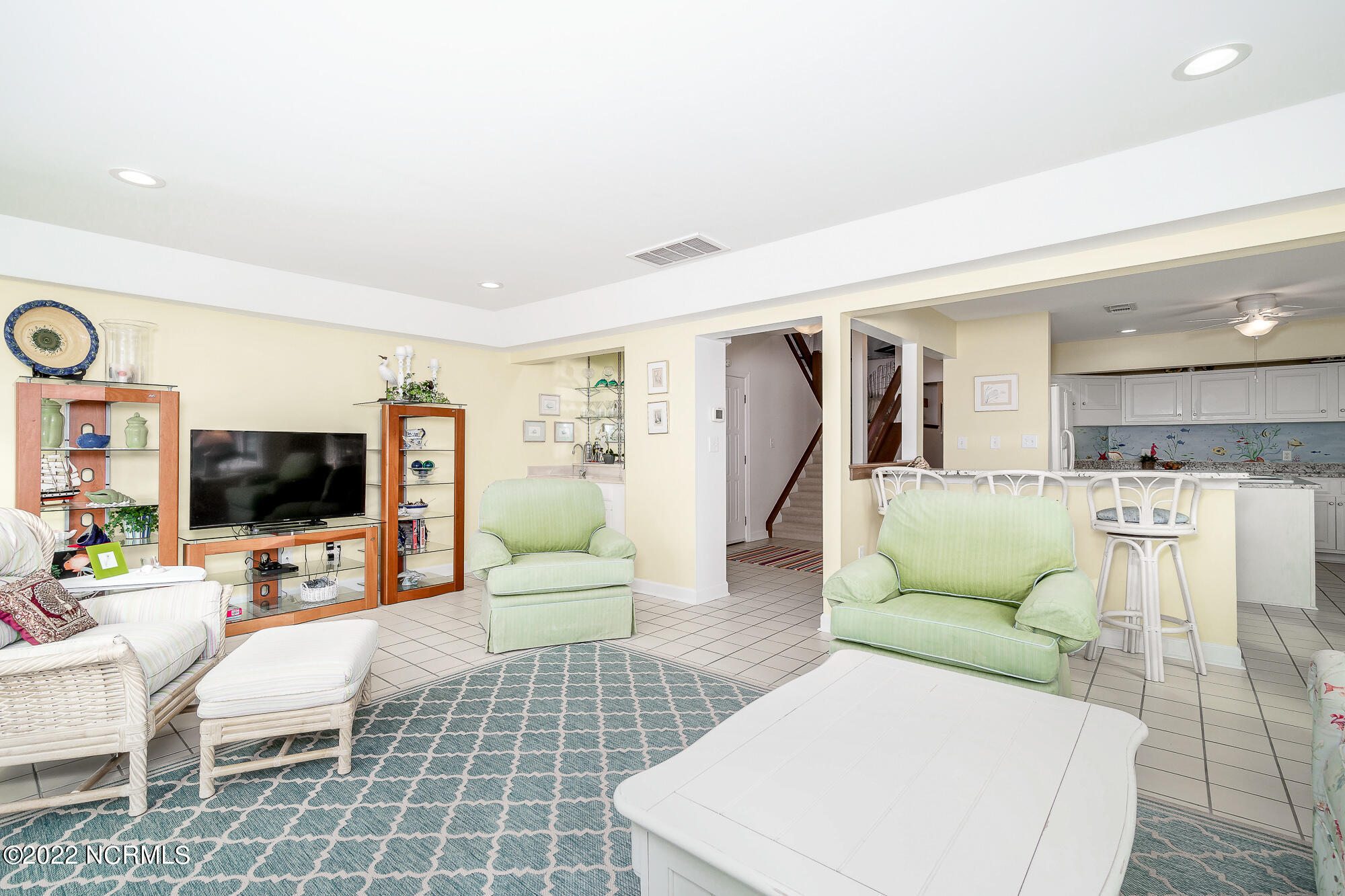 301 Salter Path Road, Unit 14 GENESIS Pine Knoll Shores, NC 28512 - Photo 14 of 62 Light-filled living room w/ corner views