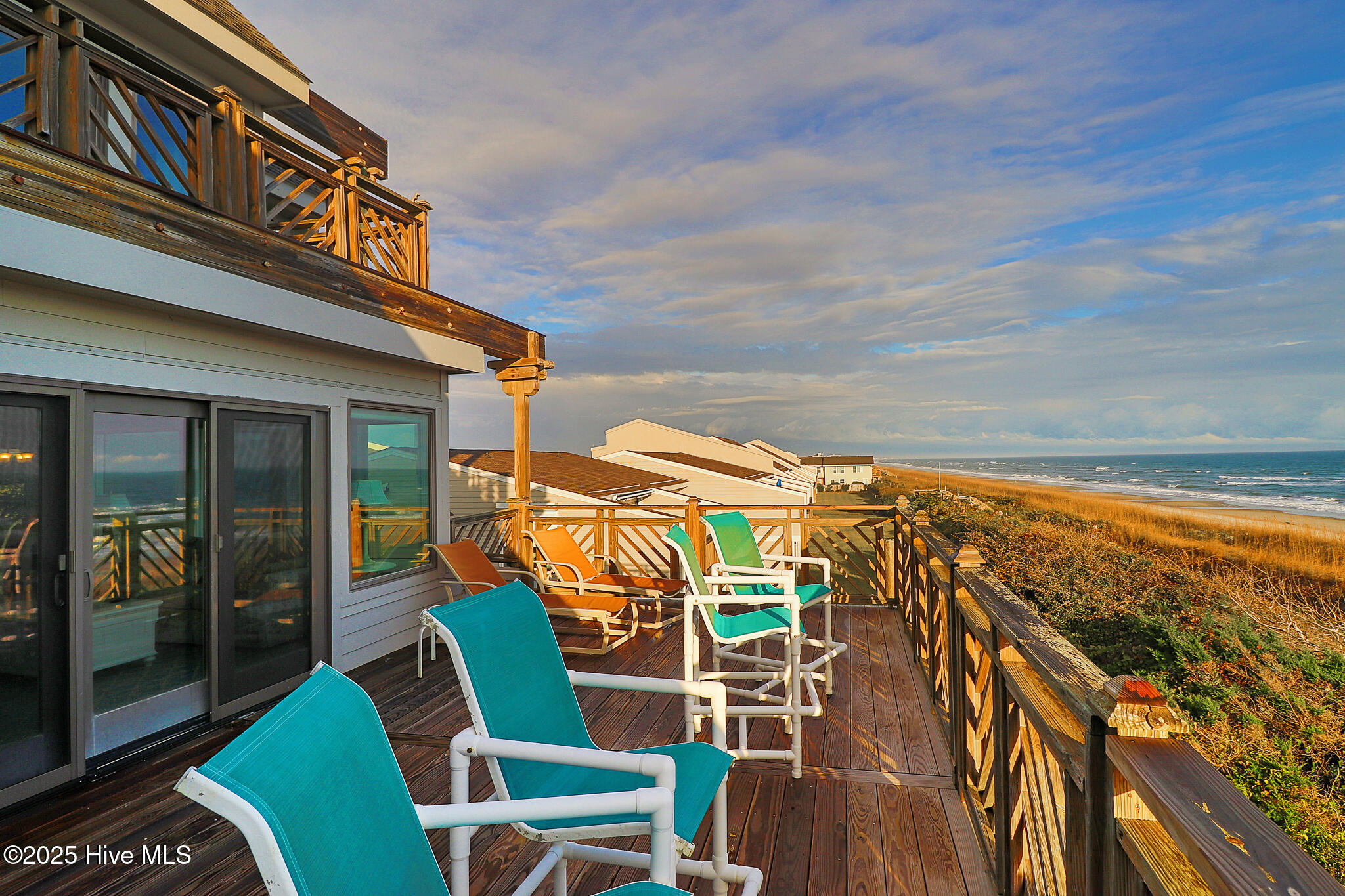 301 Salter Path Road, Unit 14 GENESIS Pine Knoll Shores, NC 28512 - Photo 16 of 62 Deck from Living Room