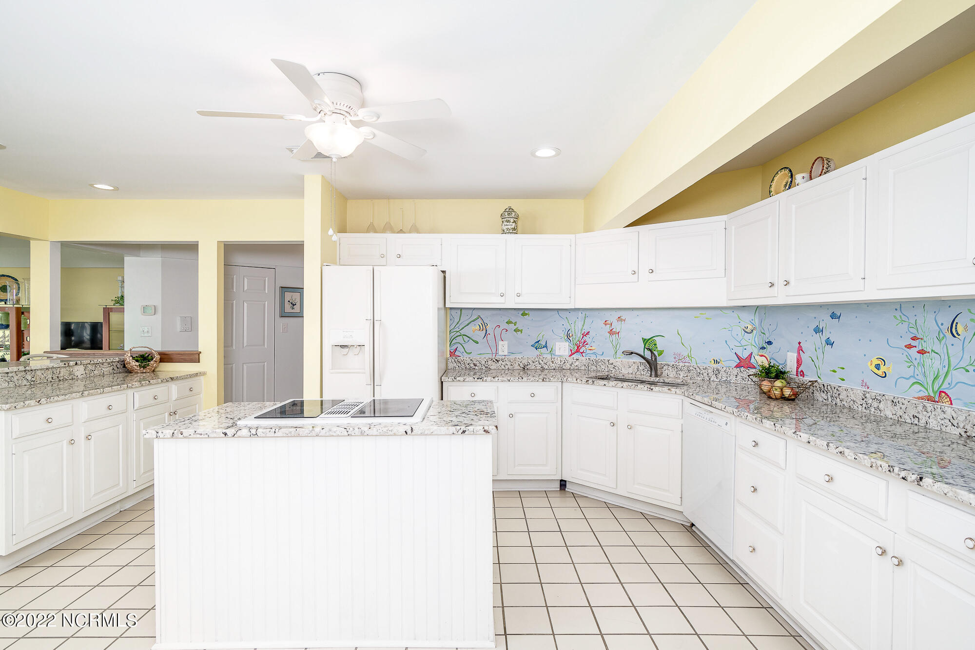301 Salter Path Road, Unit 14 GENESIS Pine Knoll Shores, NC 28512 - Photo 21 of 62 Spacious, eat-in kitchen w/ island