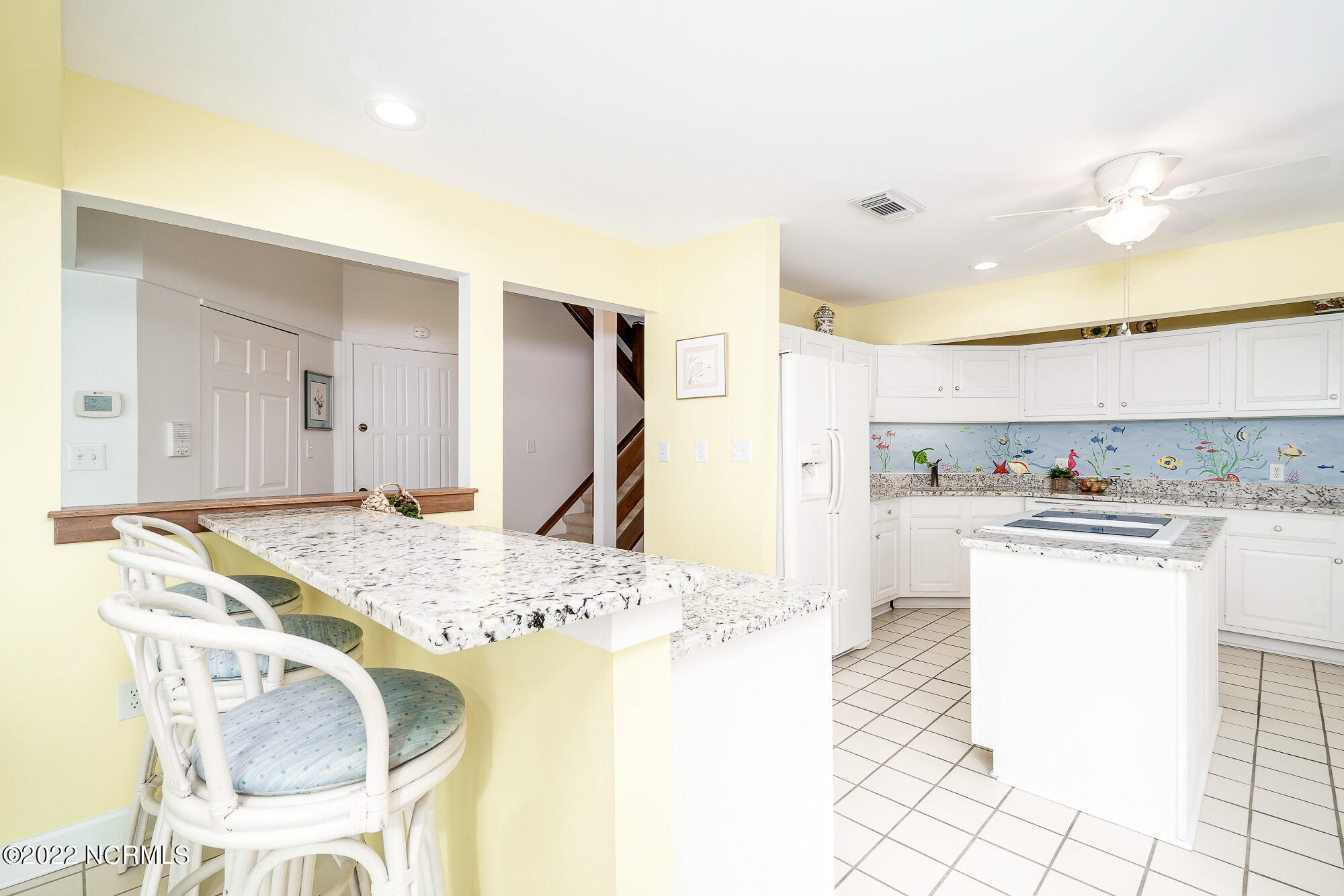 301 Salter Path Road, Unit 14 GENESIS Pine Knoll Shores, NC 28512 - Photo 22 of 62 Spacious, eat-in kitchen w/ island