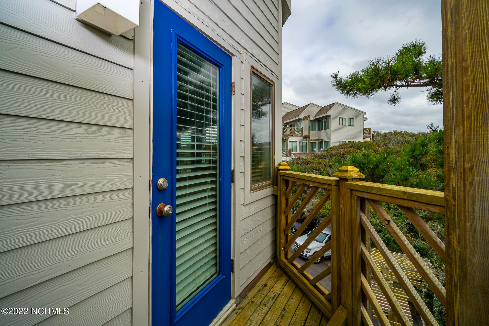 301 Salter Path Road, Unit 14 GENESIS Pine Knoll Shores, NC 28512 - Photo 36 of 62 Small deck off guest suite