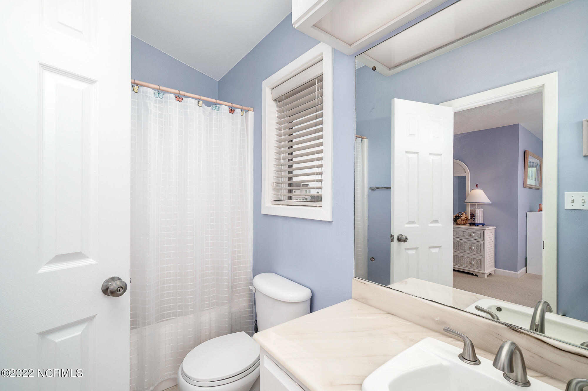 301 Salter Path Road, Unit 14 GENESIS Pine Knoll Shores, NC 28512 - Photo 40 of 62 En suite guest bathroom