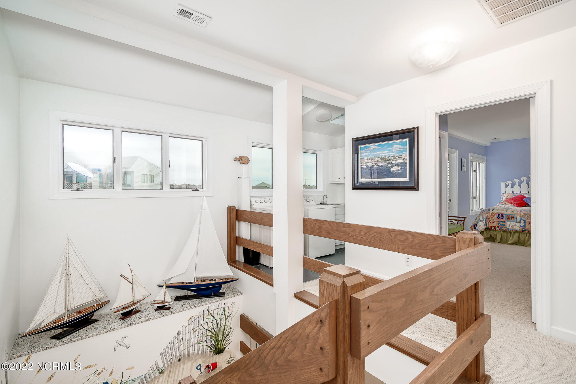 301 Salter Path Road, Unit 14 GENESIS Pine Knoll Shores, NC 28512 - Photo 41 of 62 Upstairs landing/staircase