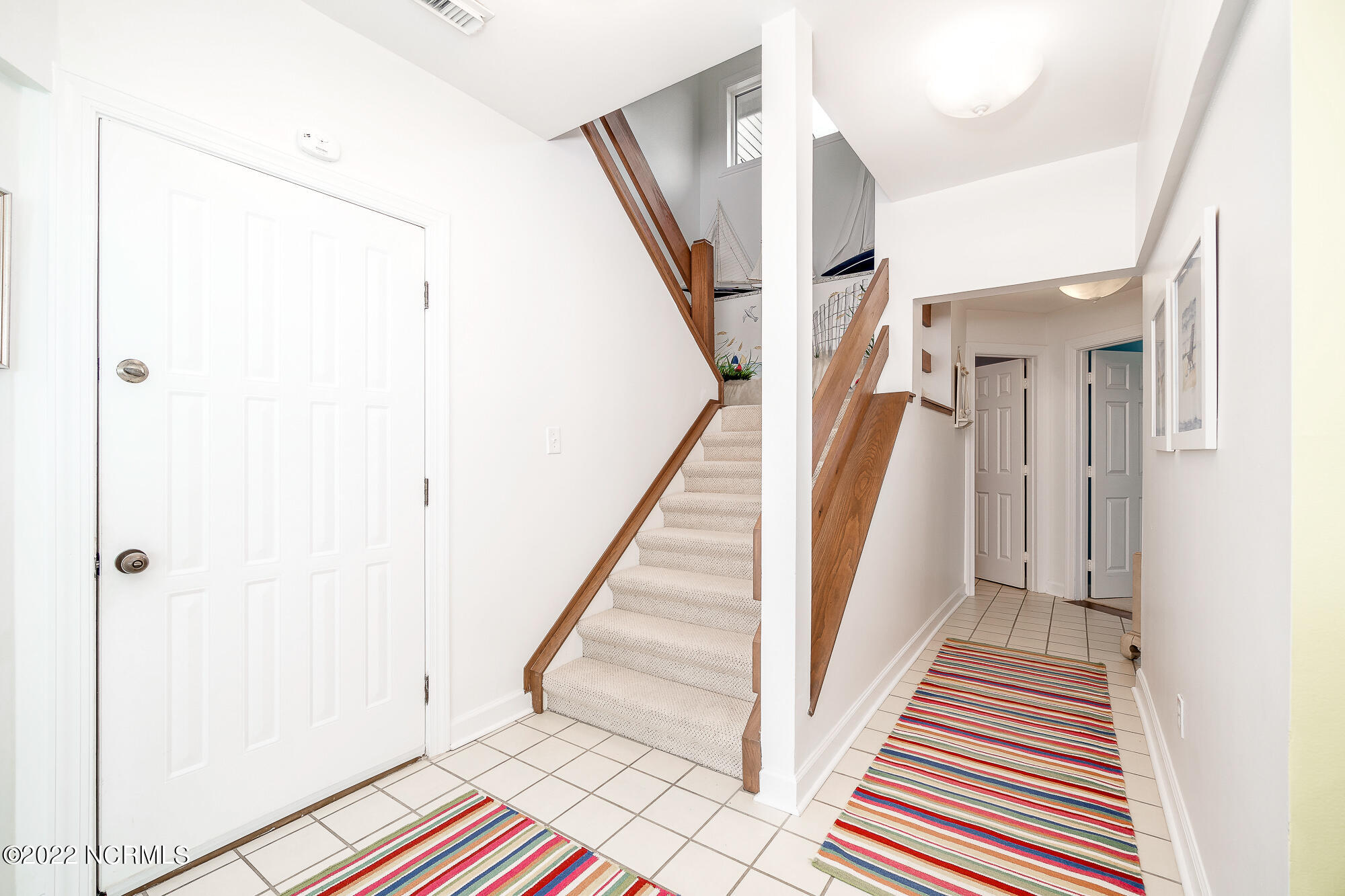301 Salter Path Road, Unit 14 GENESIS Pine Knoll Shores, NC 28512 - Photo 44 of 62 Main entrance/staircase