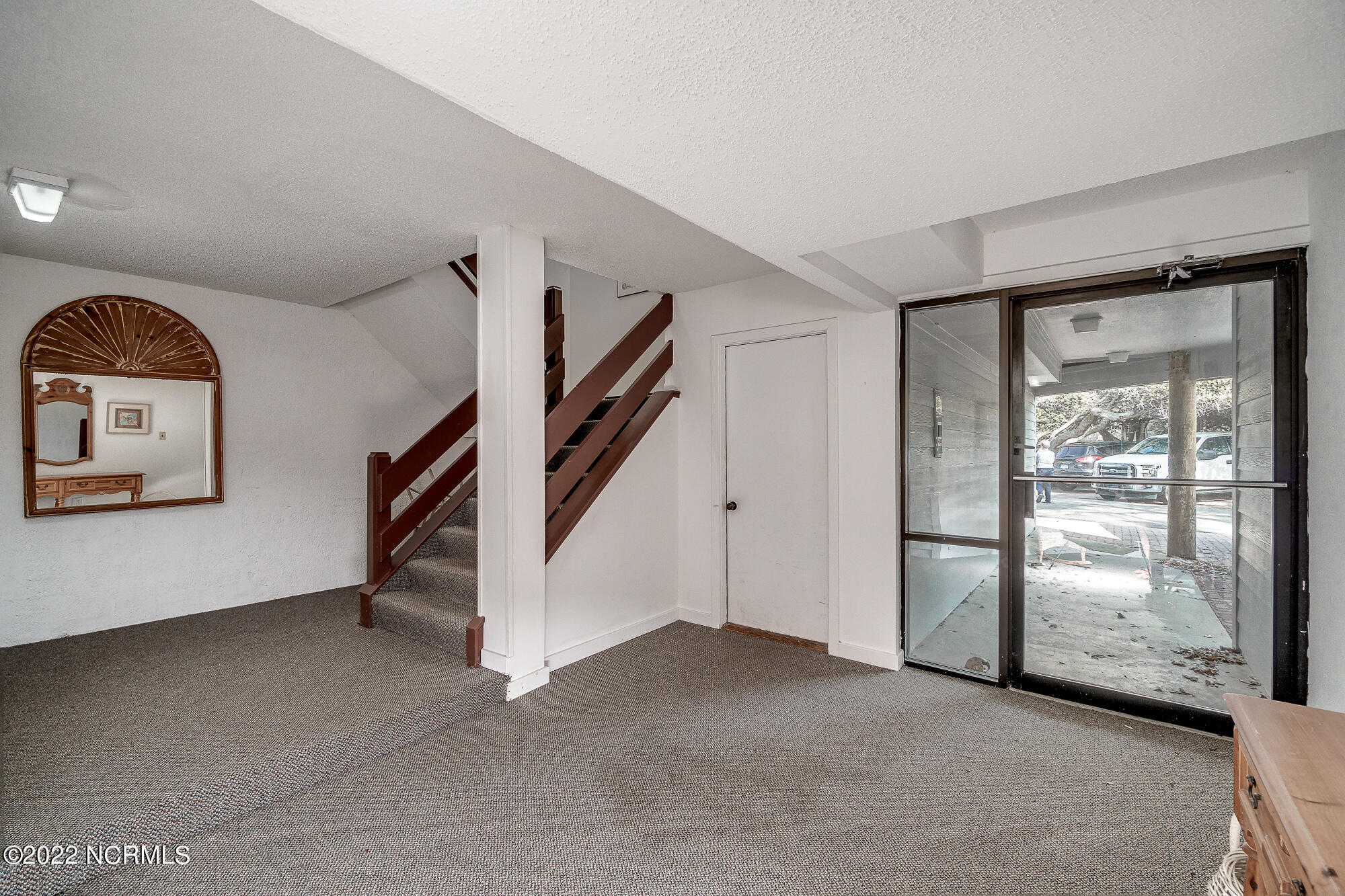 301 Salter Path Road, Unit 14 GENESIS Pine Knoll Shores, NC 28512 - Photo 45 of 62 Enclosed entry to condo