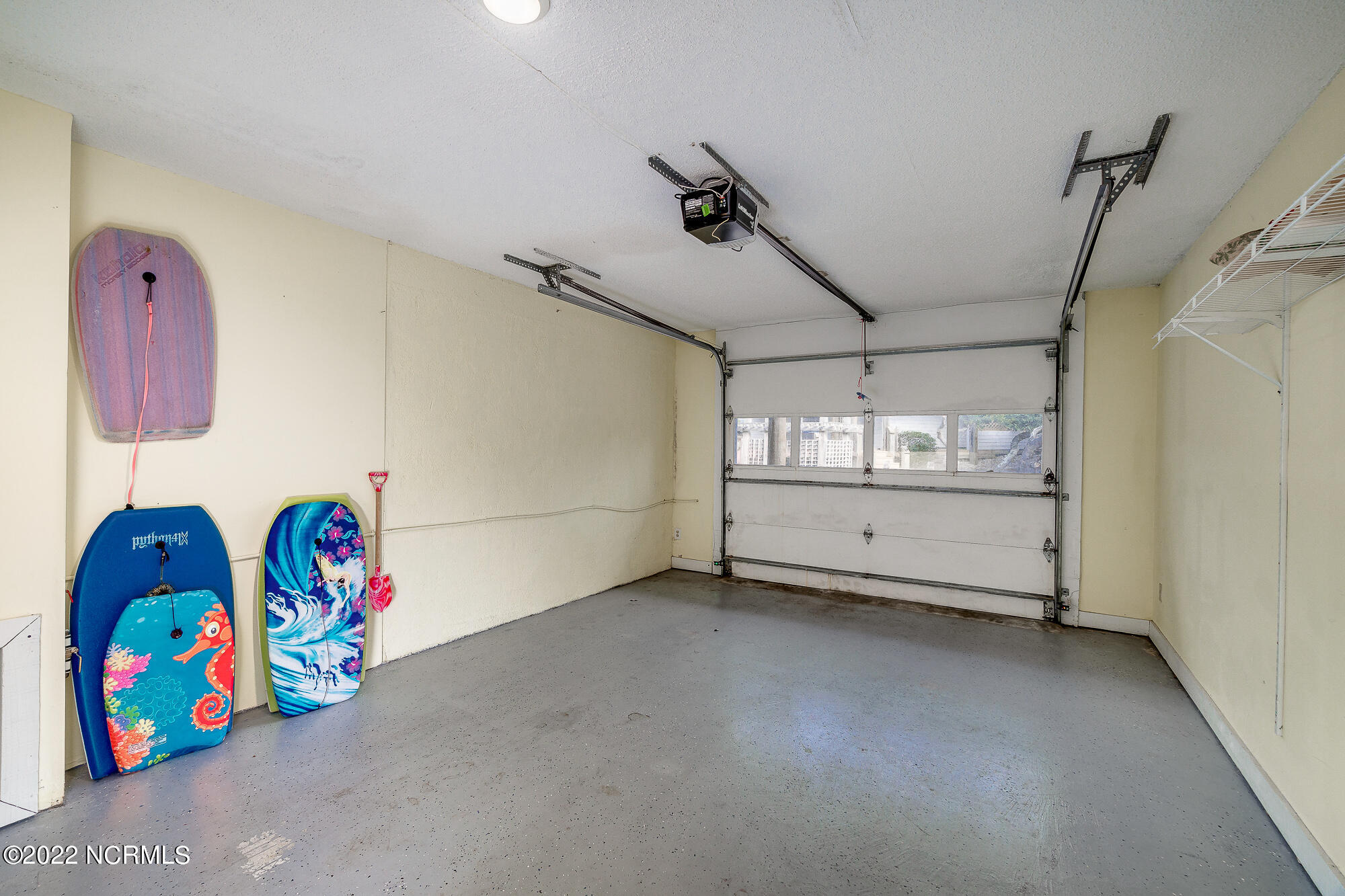 301 Salter Path Road, Unit 14 GENESIS Pine Knoll Shores, NC 28512 - Photo 49 of 62 One-car garage
