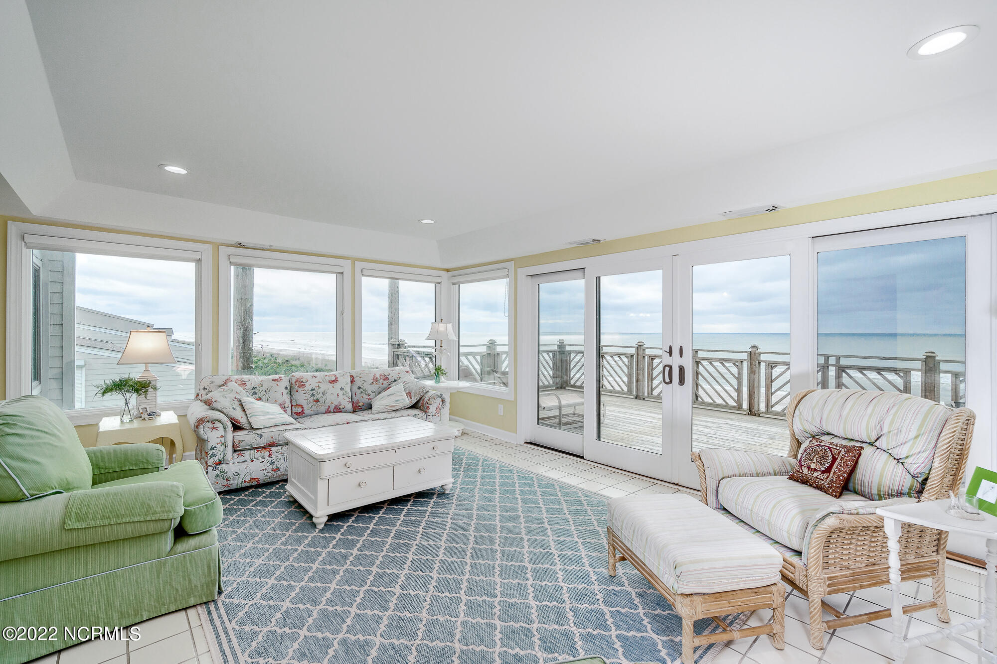 301 Salter Path Road, Unit 14 GENESIS Pine Knoll Shores, NC 28512 - Photo 5 of 62 Light-filled living room w/ corner views