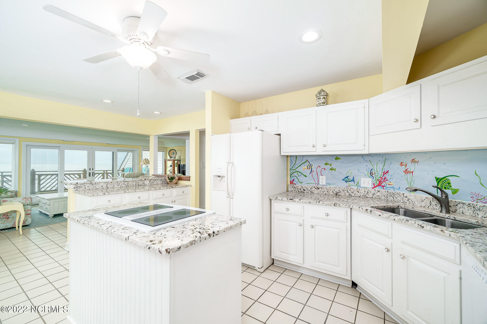 301 Salter Path Road, Unit 14 GENESIS Pine Knoll Shores, NC 28512 - Photo 8 of 62 Spacious, eat-in kitchen w/ island
