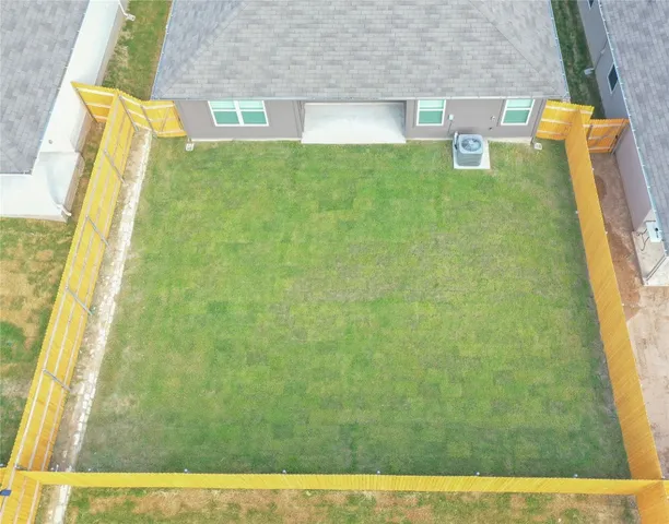 a view of a bathroom with a sink and a mirror