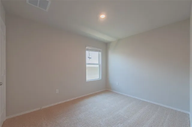 an empty room with window