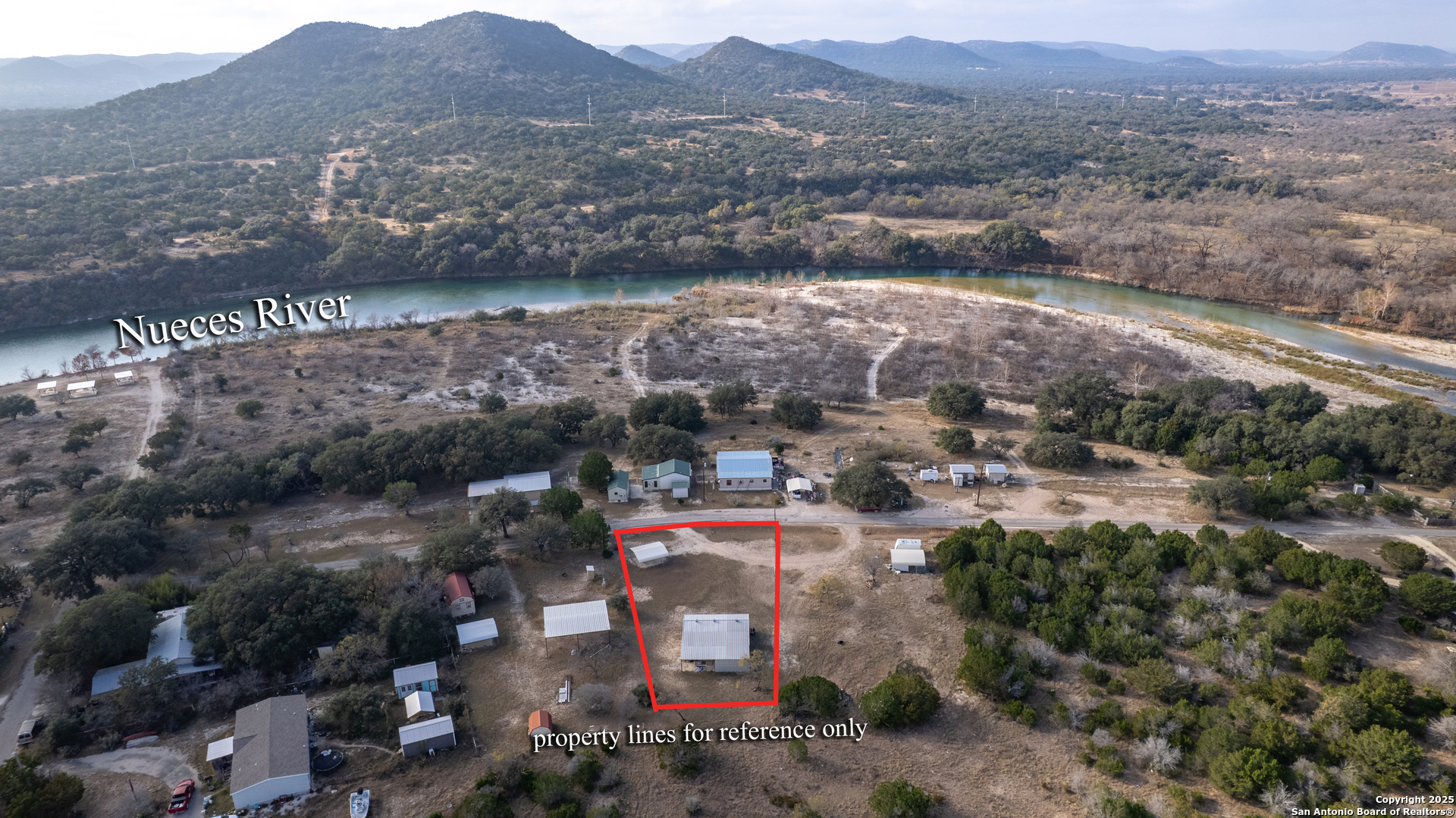 33 North River View Road Camp Wood, TX 78833 - Photo 14 of 27 an aerial view of residential building and lake