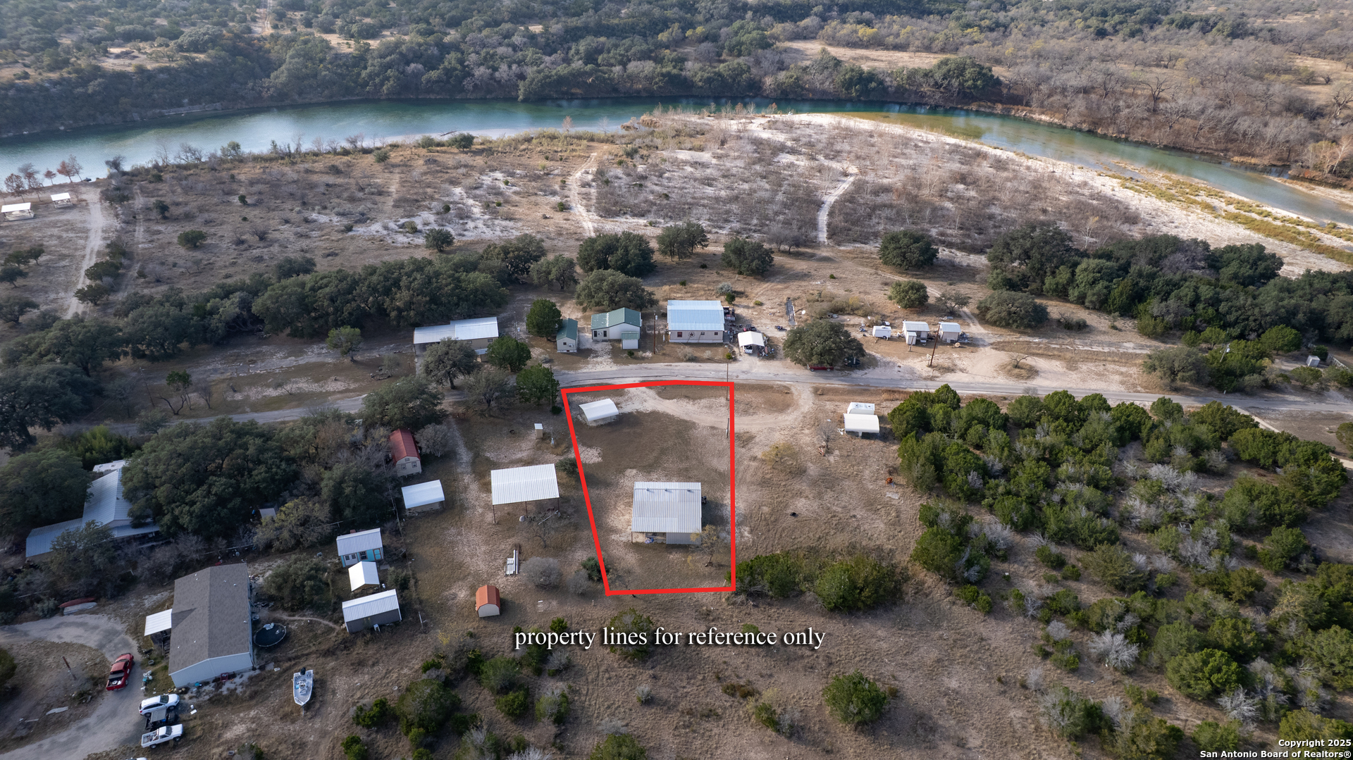 33 North River View Road Camp Wood, TX 78833 - Photo 15 of 27 an aerial view of a houses with outdoor space