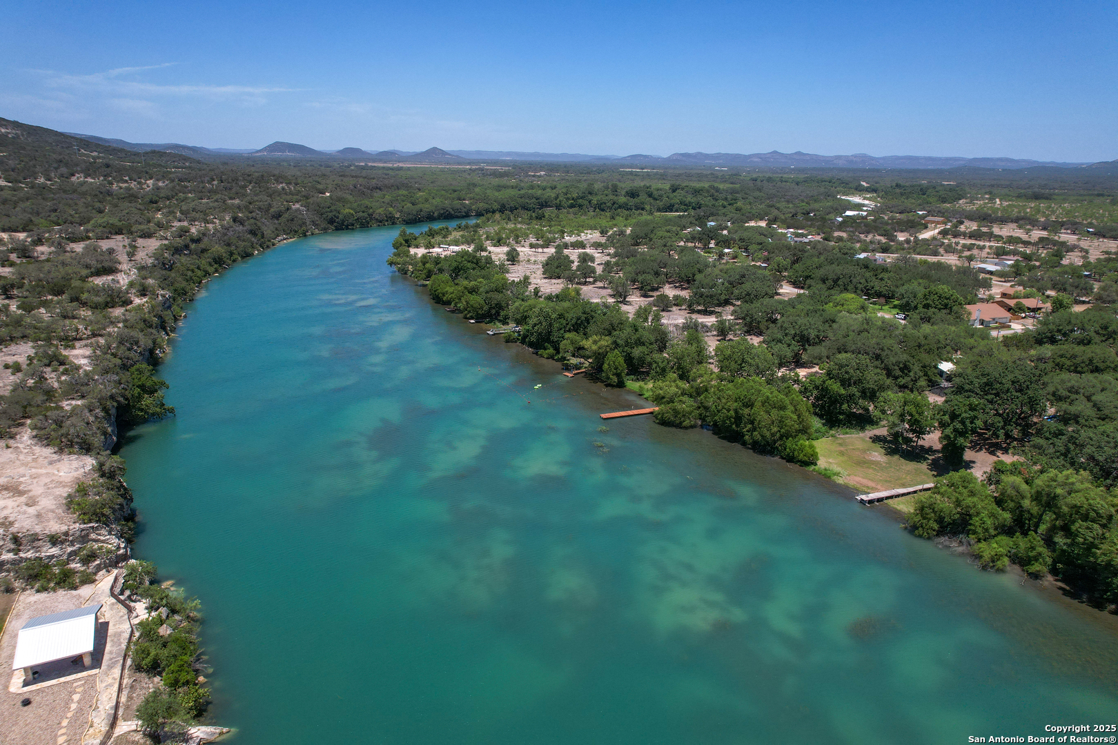 33 North River View Road Camp Wood, TX 78833 - Photo 21 of 27 a view of a city with mountains in the background