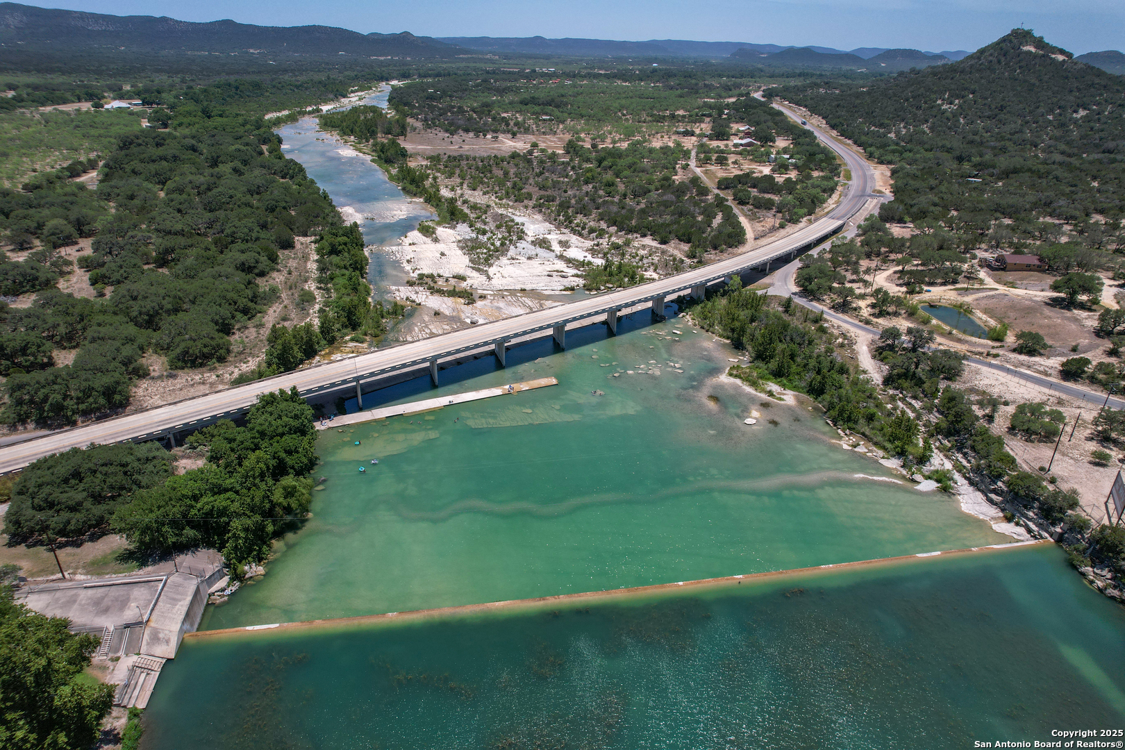 33 North River View Road Camp Wood, TX 78833 - Photo 25 of 27 an aerial view of residential houses with outdoor space and river