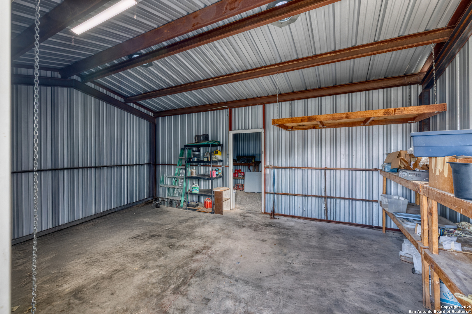 33 North River View Road Camp Wood, TX 78833 - Photo 8 of 27 a view of storage and utility room