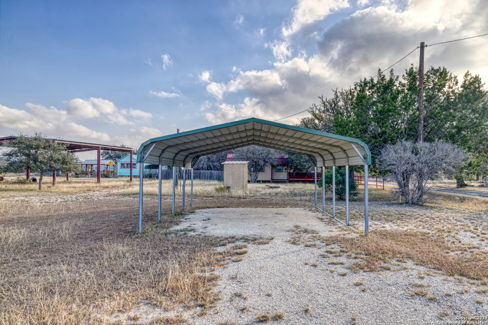 33 North River View Road Camp Wood, TX 78833 - Photo 9 of 27 a view of a house with a backyard