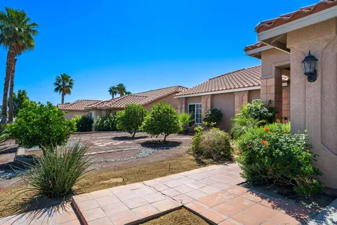 a house view with a garden space