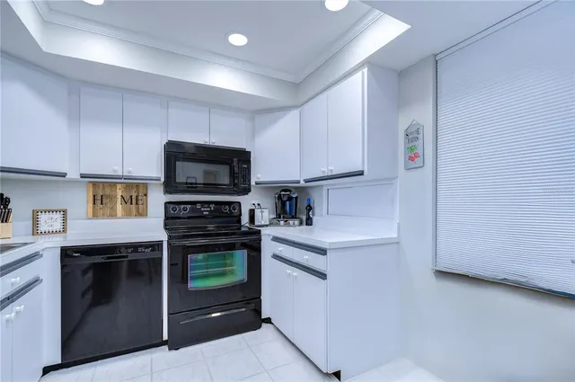 a kitchen with a stove and a microwave