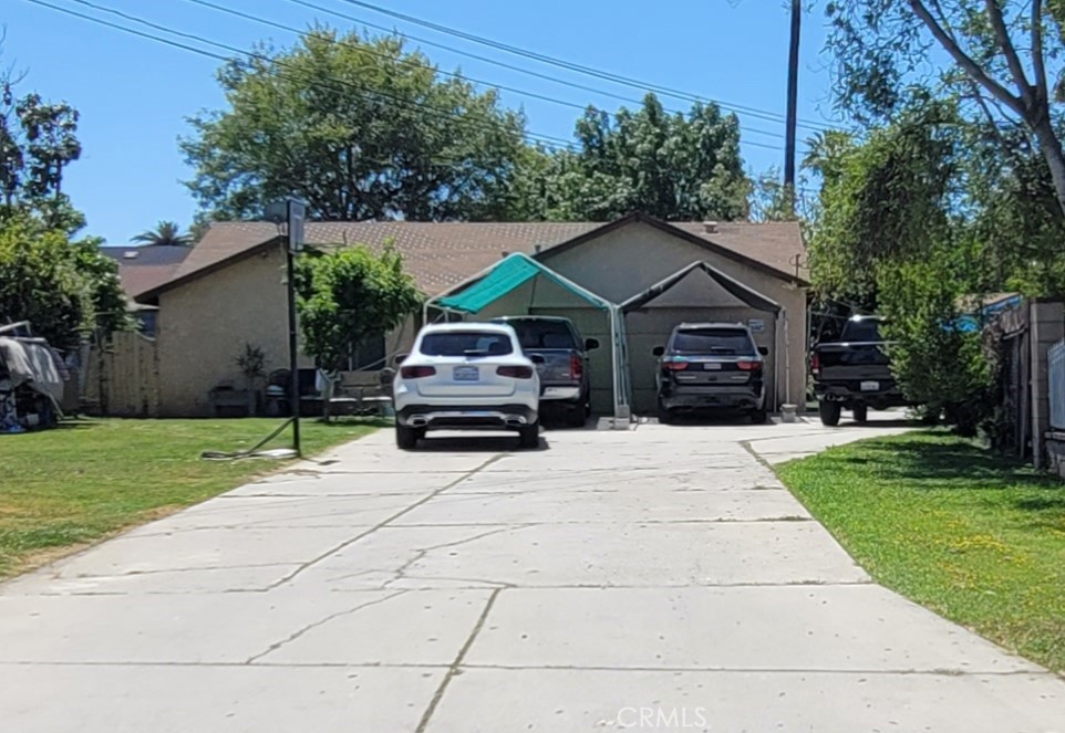 2526 5th Street Riverside, CA 92507 - Photo 1 of 1 a front view of a house with a garden