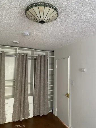 a view of wooden floor in an empty room