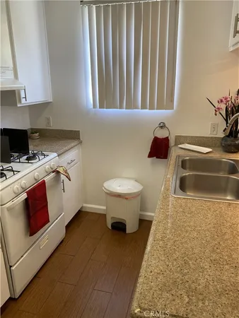 a bathroom with a sink toilet and vanity