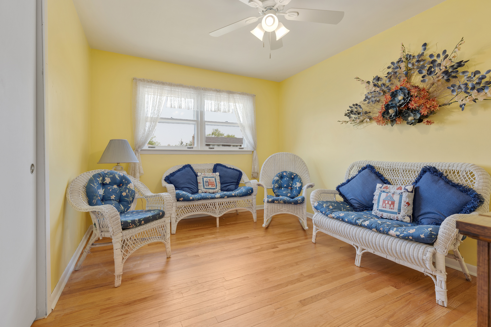 9363 Clancy Drive Des Plaines, IL 60016 - Photo 14 of 27 a living room with furniture and a chandelier