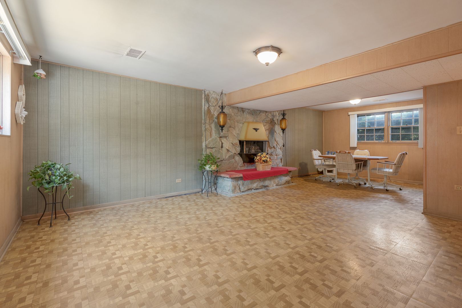 9363 Clancy Drive Des Plaines, IL 60016 - Photo 15 of 27 a living room with furniture and a chandelier