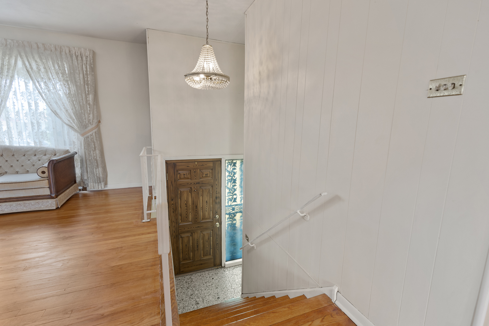9363 Clancy Drive Des Plaines, IL 60016 - Photo 2 of 27 a view of livingroom with hardwood floor and window