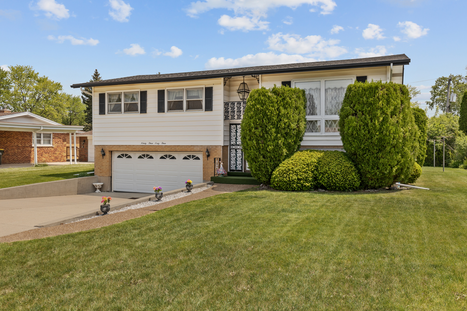 9363 Clancy Drive Des Plaines, IL 60016 - Photo 24 of 27 a front view of house with yard