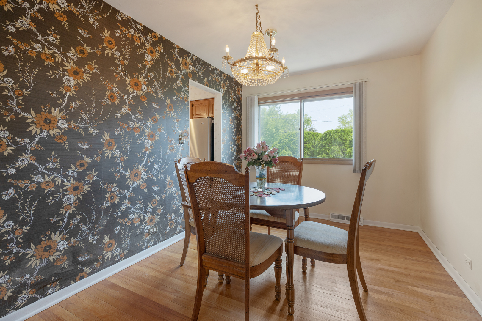9363 Clancy Drive Des Plaines, IL 60016 - Photo 7 of 27 a view of a dining room with furniture window and outside view