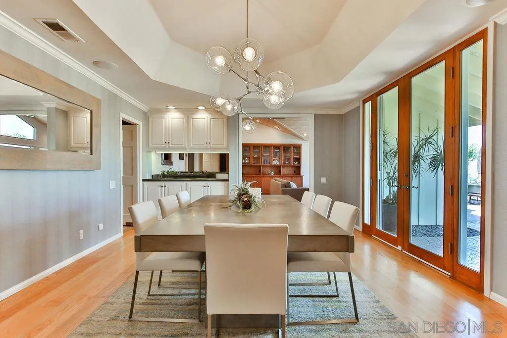 17695 Valle Verde Road Poway, CA 92064 - Photo 12 of 63 a view of a dining room with furniture window and wooden floor