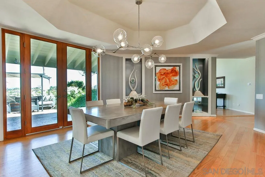 17695 Valle Verde Road Poway, CA 92064 - Photo 13 of 63 a view of a dining room with furniture window and wooden floor