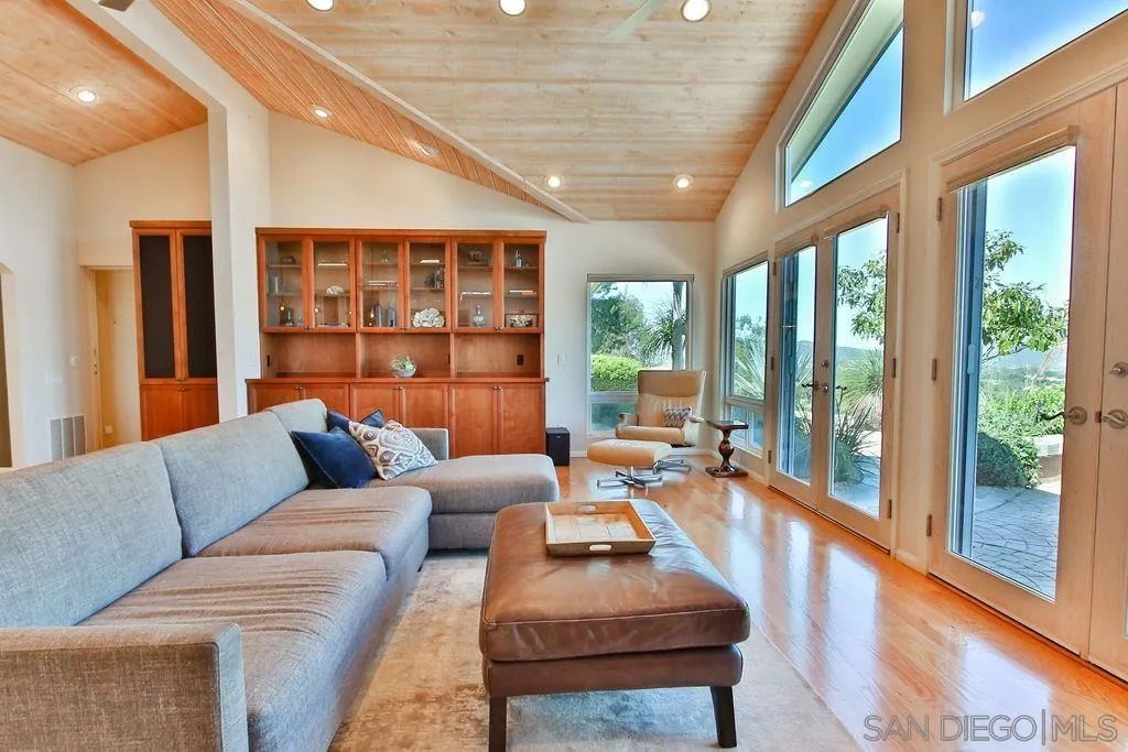 17695 Valle Verde Road Poway, CA 92064 - Photo 15 of 63 a living room with furniture and a large window