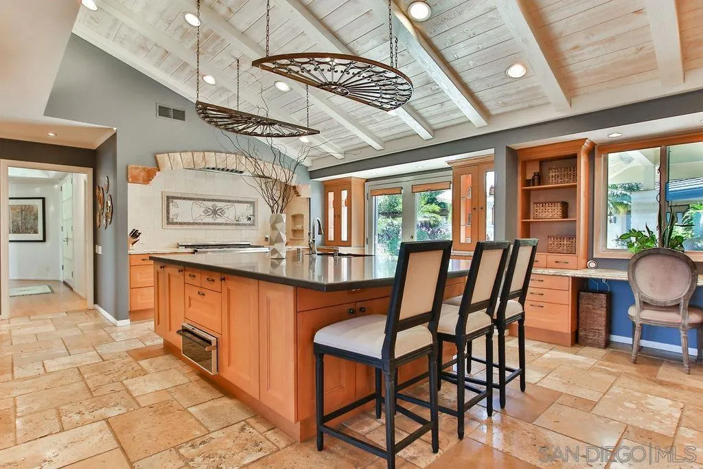 17695 Valle Verde Road Poway, CA 92064 - Photo 19 of 63 a view of a dining room with furniture window and wooden floor