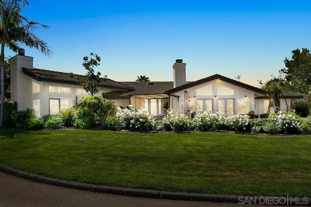 17695 Valle Verde Road Poway, CA 92064 - Photo 2 of 63 a front view of a house with garden