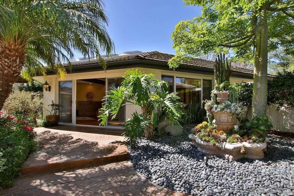 17695 Valle Verde Road Poway, CA 92064 - Photo 45 of 63 a view of a house with potted plants