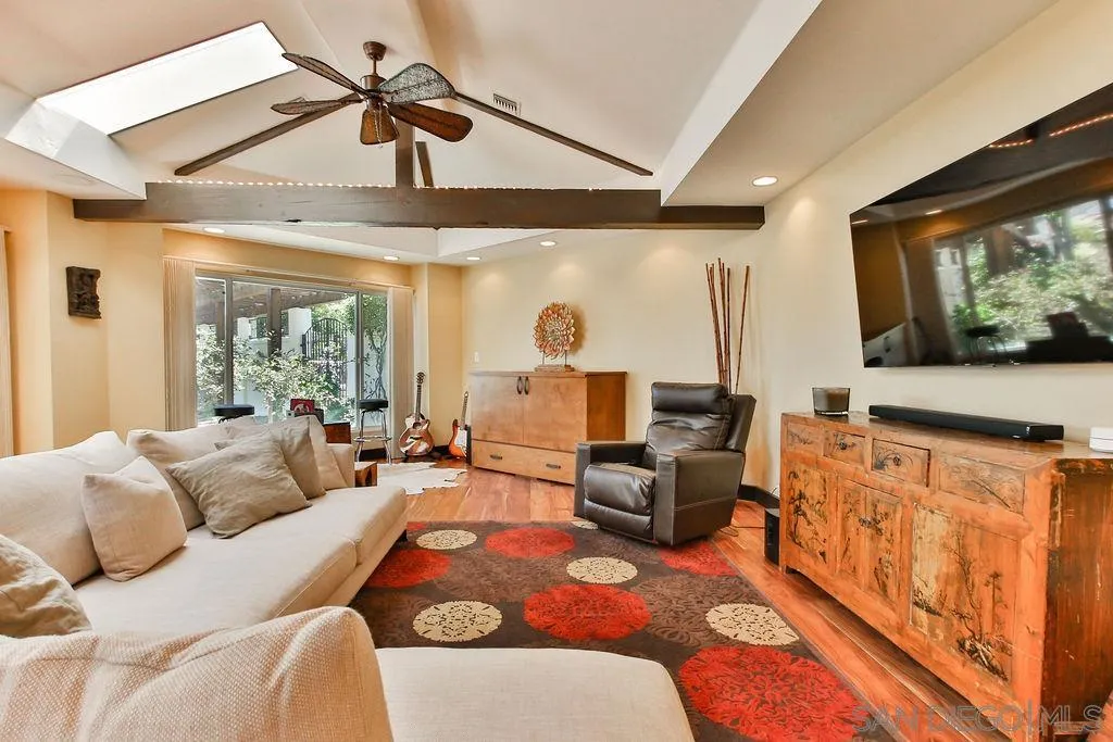 17695 Valle Verde Road Poway, CA 92064 - Photo 47 of 63 a living room with furniture and a flat screen tv