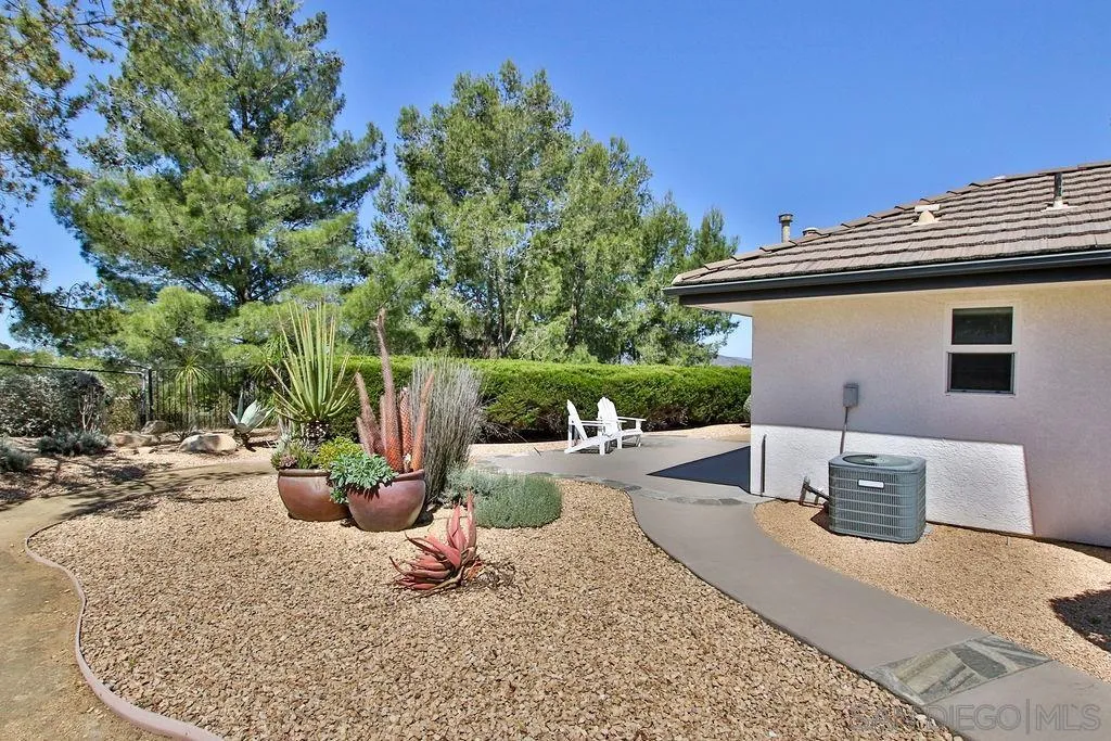 17695 Valle Verde Road Poway, CA 92064 - Photo 56 of 63 a view of a backyard with sitting area
