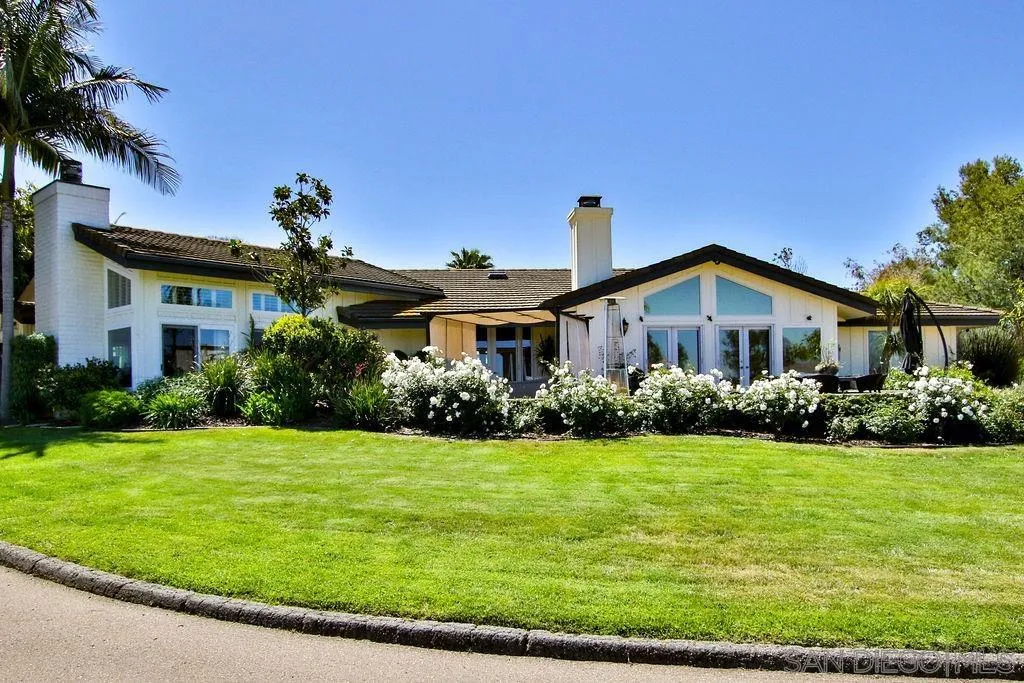 17695 Valle Verde Road Poway, CA 92064 - Photo 60 of 63 a front view of a house with garden