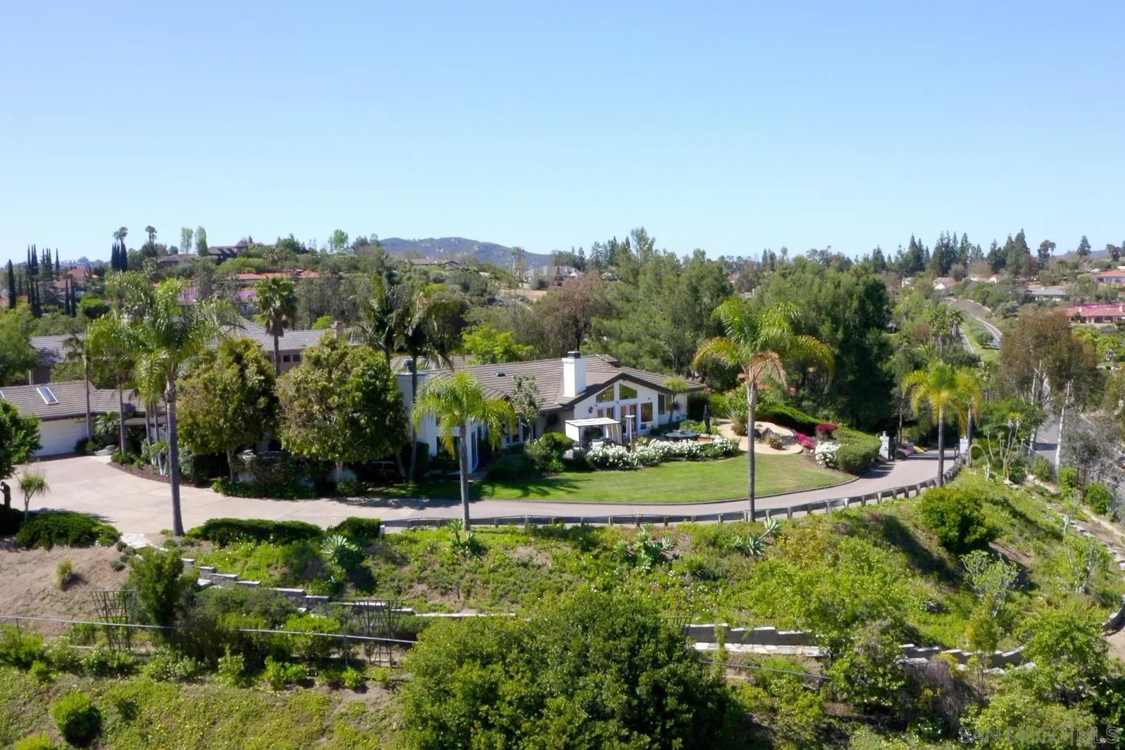 17695 Valle Verde Road Poway, CA 92064 - Photo 61 of 63 a view of a town with barn and large trees