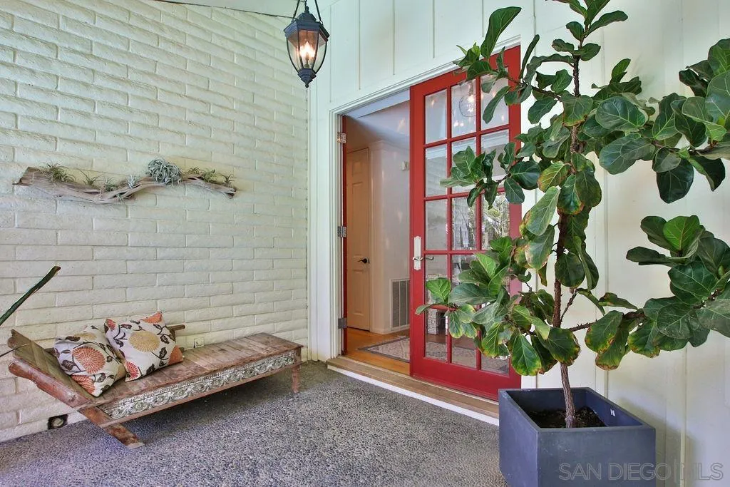 17695 Valle Verde Road Poway, CA 92064 - Photo 7 of 63 a potted plant sitting in front of a door