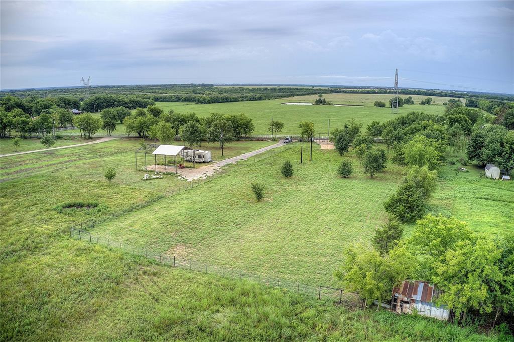 868 County Road 23940 Brookston, TX 75421 - Photo 23 of 29 a view of a lush green field