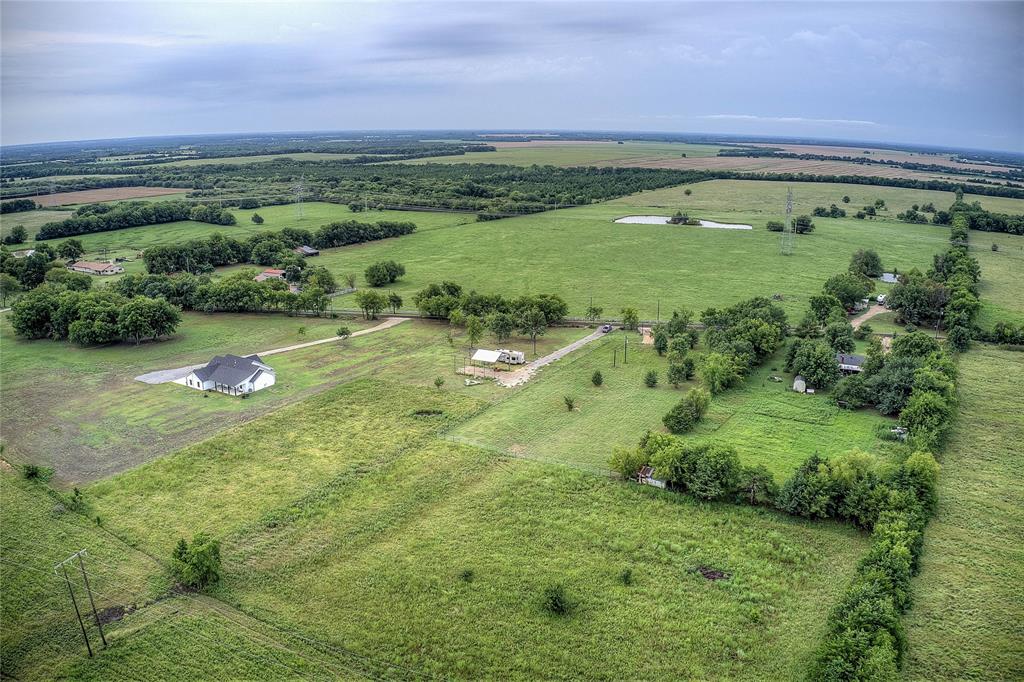 868 County Road 23940 Brookston, TX 75421 - Photo 24 of 29 a view of a lush green space