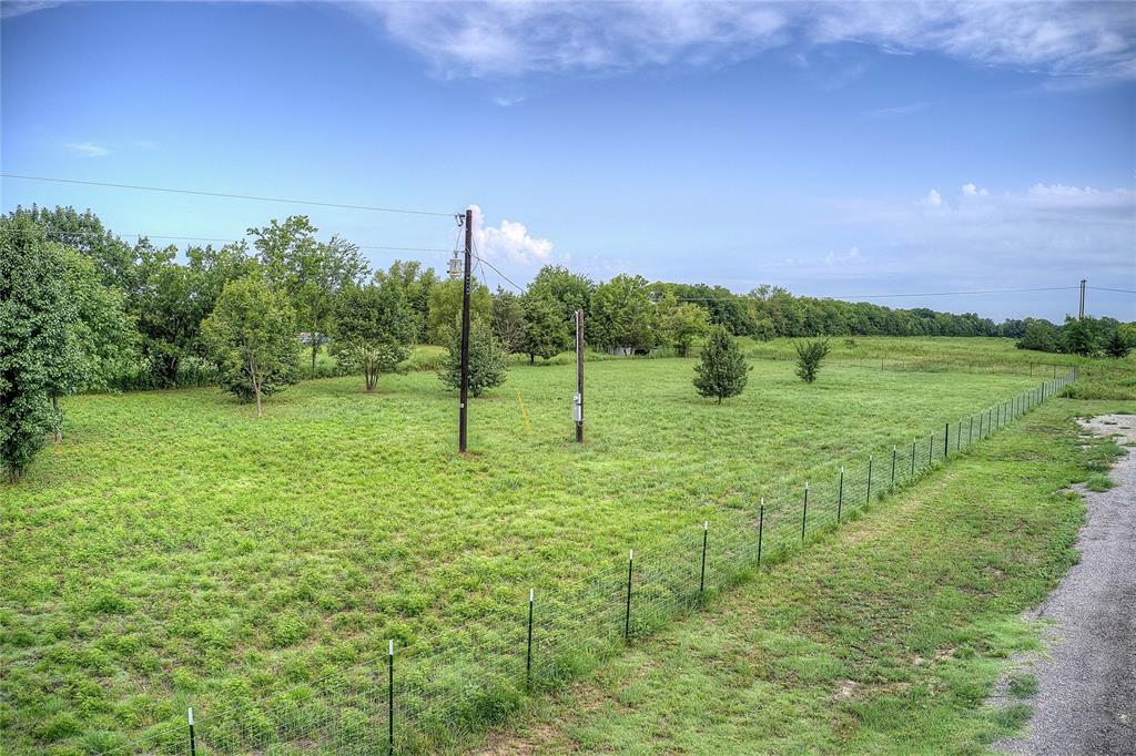 868 County Road 23940 Brookston, TX 75421 - Photo 28 of 29 a view of a green field with plants