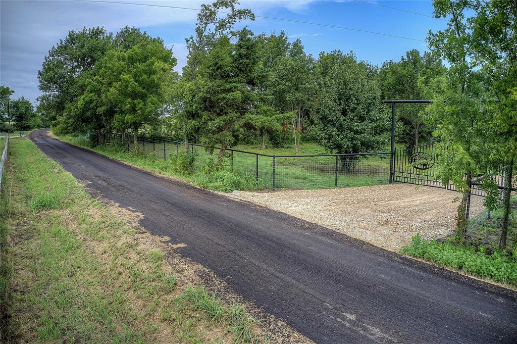 868 County Road 23940 Brookston, TX 75421 - Photo 4 of 29 a view of a park with large trees