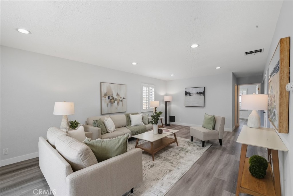 916 Othello Street Arcadia, CA 91006 - Photo 16 of 56 a living room with furniture and wooden floor